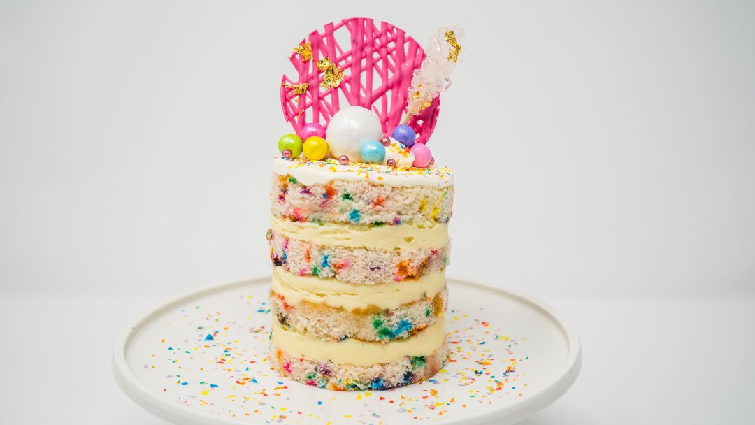 A photo of mint colored macarons tiered display
